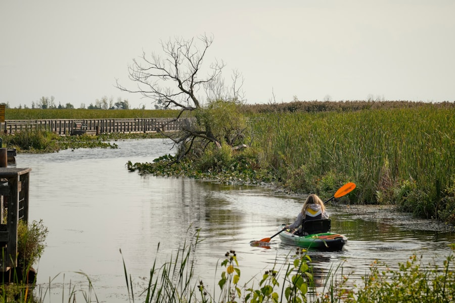 A kayaker paddling through Lowcountry marsh creeks